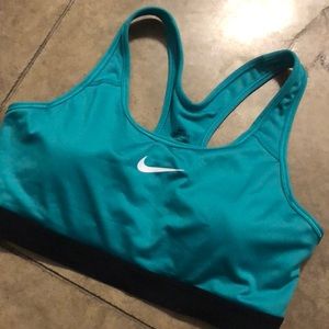 turquoise nike padded sports bra